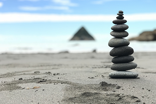 stones stacked on beach